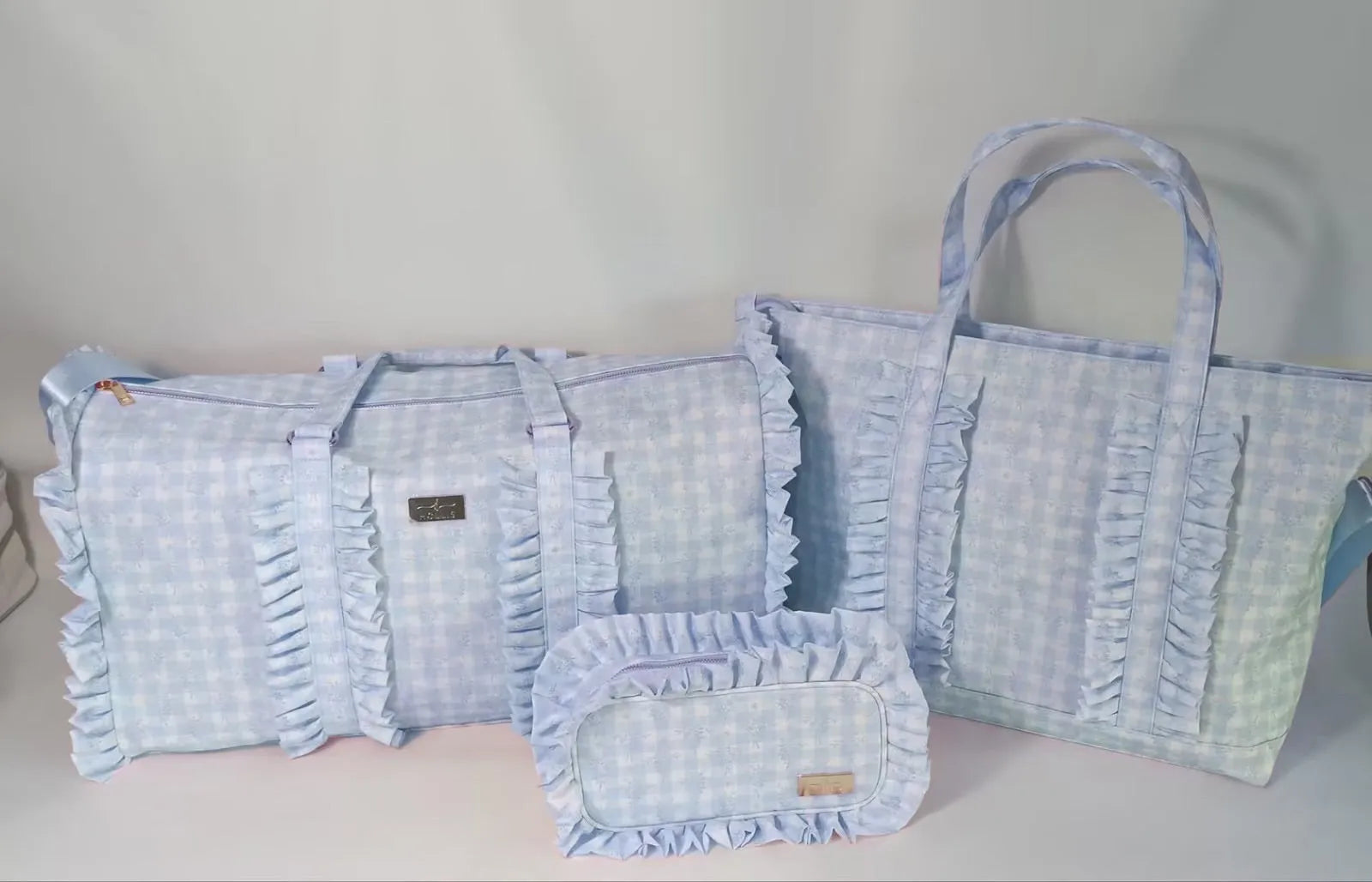 HOLLIS Blue Floral Bags on Simply Obsessed