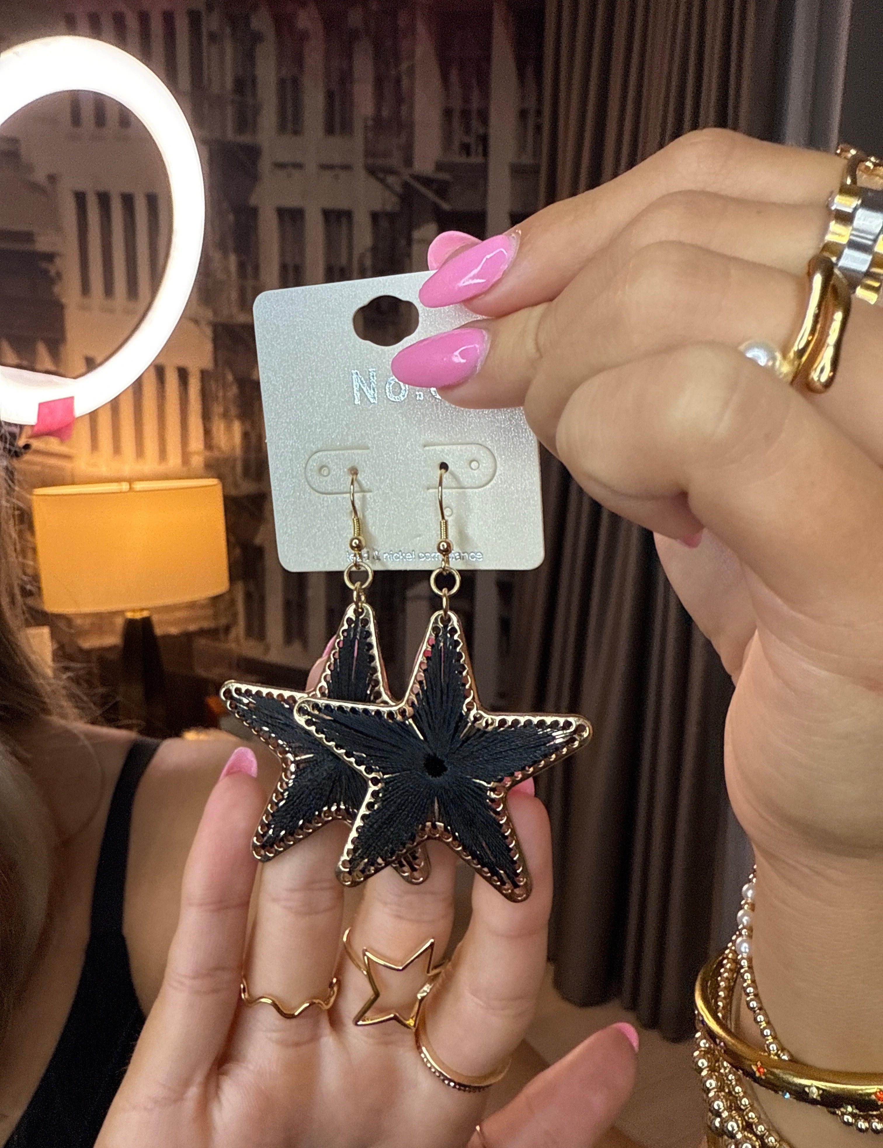 LA Finds Black String Star Earrings on Simply Obsessed