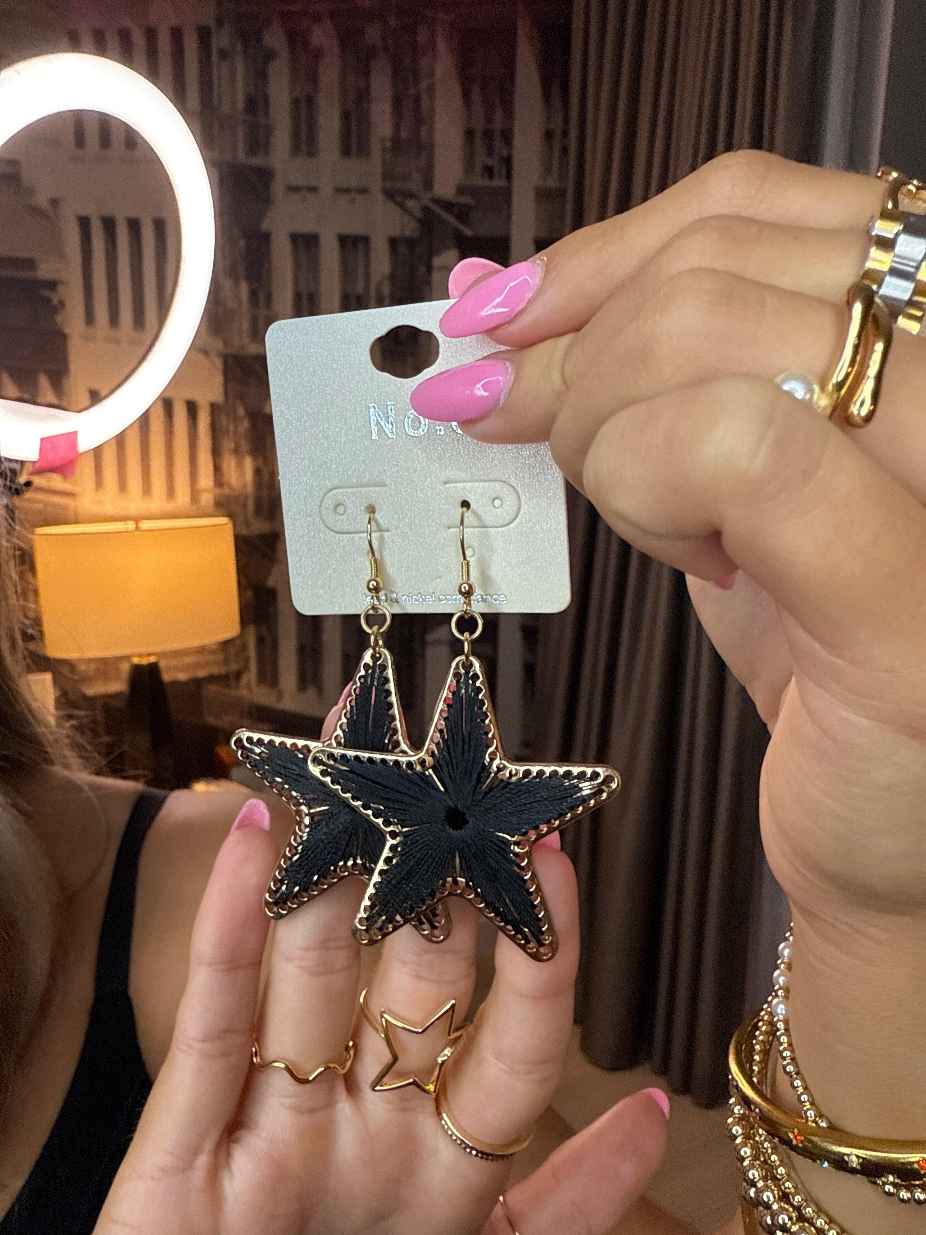 LA Finds Black String Star Earrings on Simply Obsessed