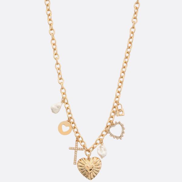 LA Finds Cross + Heart Charm Necklace on Simply Obsessed