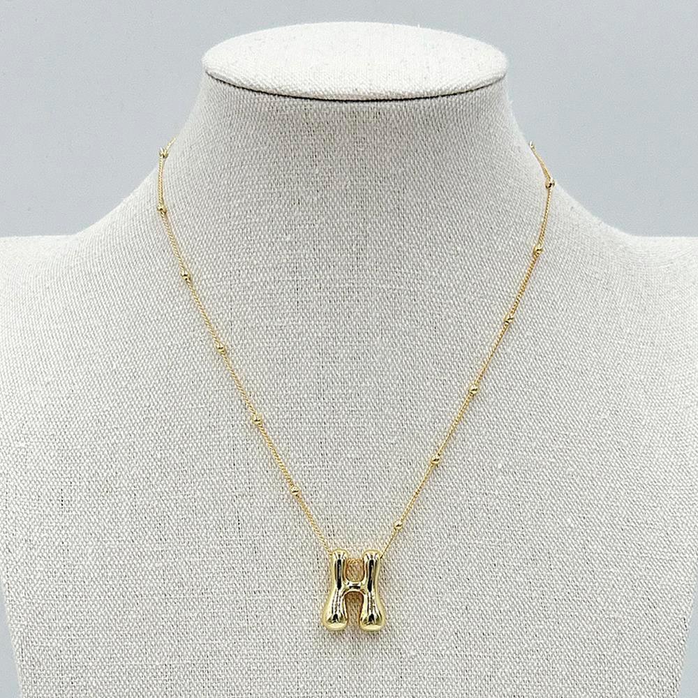 LA Finds Gold Bubble Letter Necklaces on Simply Obsessed
