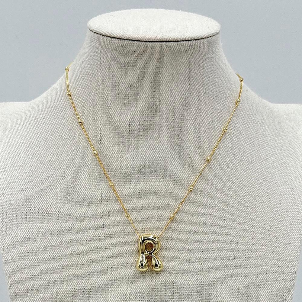 LA Finds Gold Bubble Letter Necklaces on Simply Obsessed