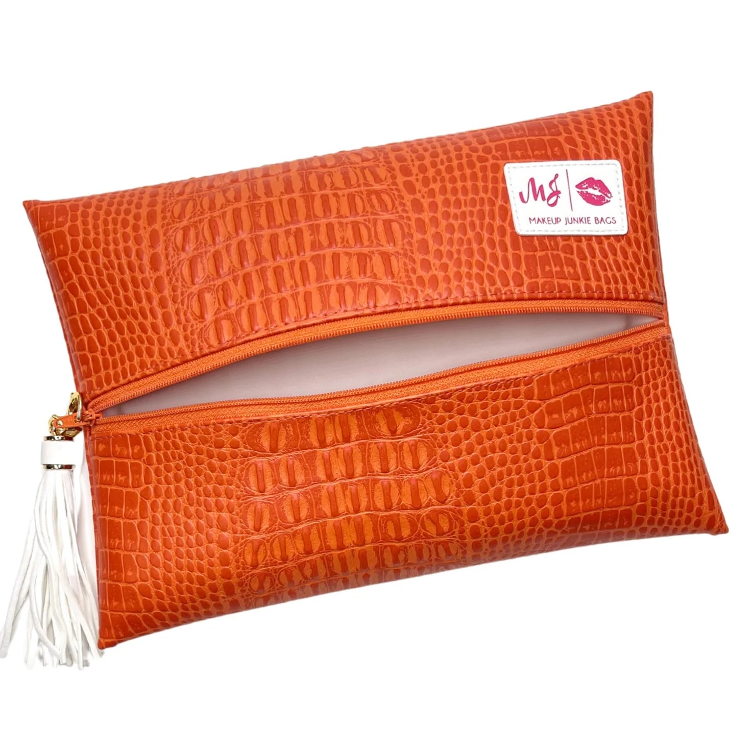 MAKEUP JUNKIE Shade of Orange Bags on Simply Obsessed