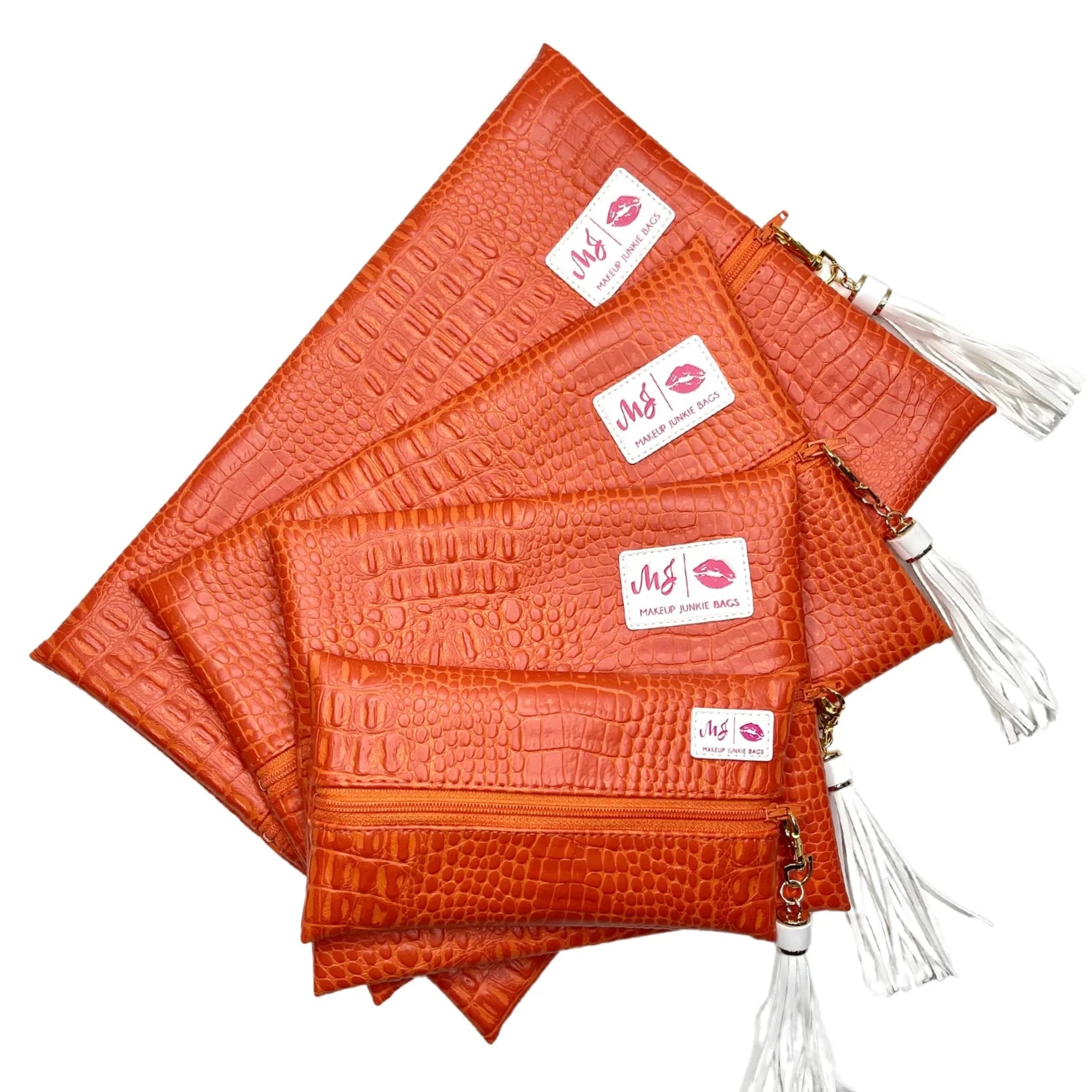 MAKEUP JUNKIE Shade of Orange Bags on Simply Obsessed