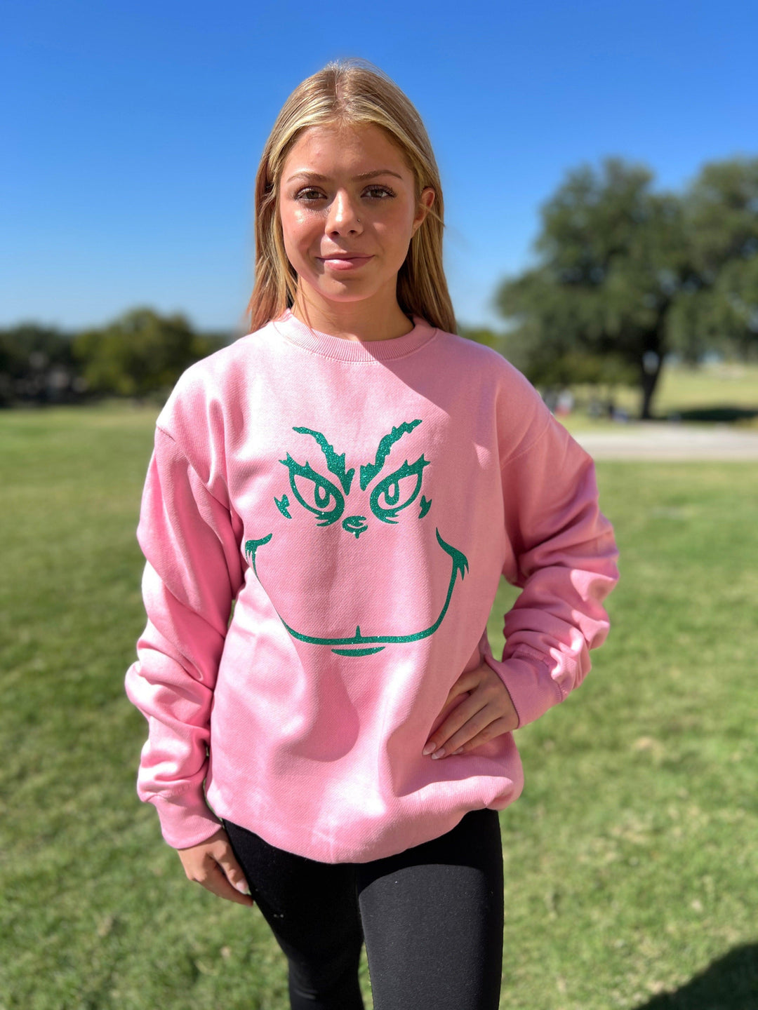 Pink Grinch Sweatshirt by Malibu Hippie on Synergy Marketplace