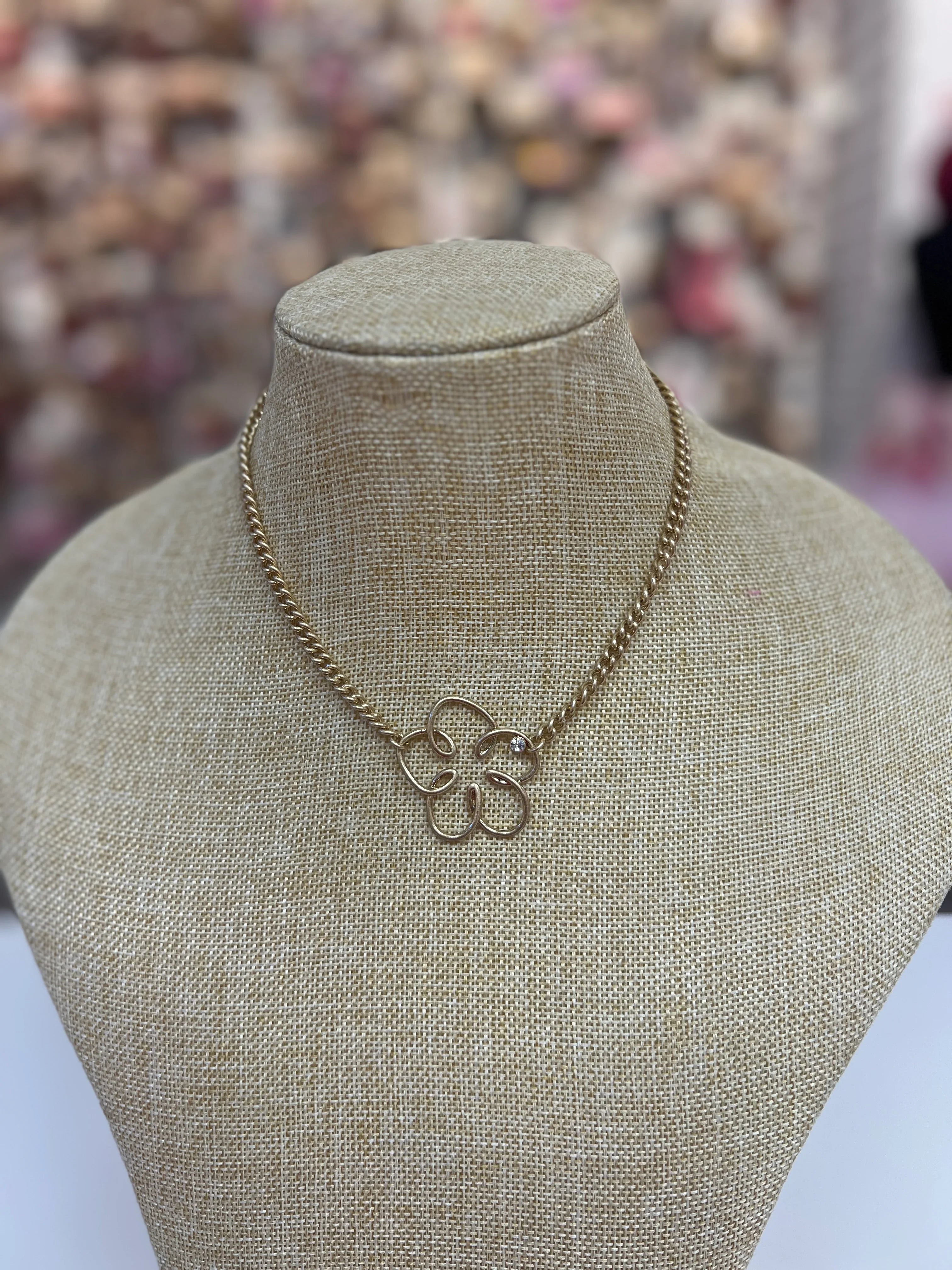 PINK PANACHE Gold Wire Flower Necklace on Simply Obsessed