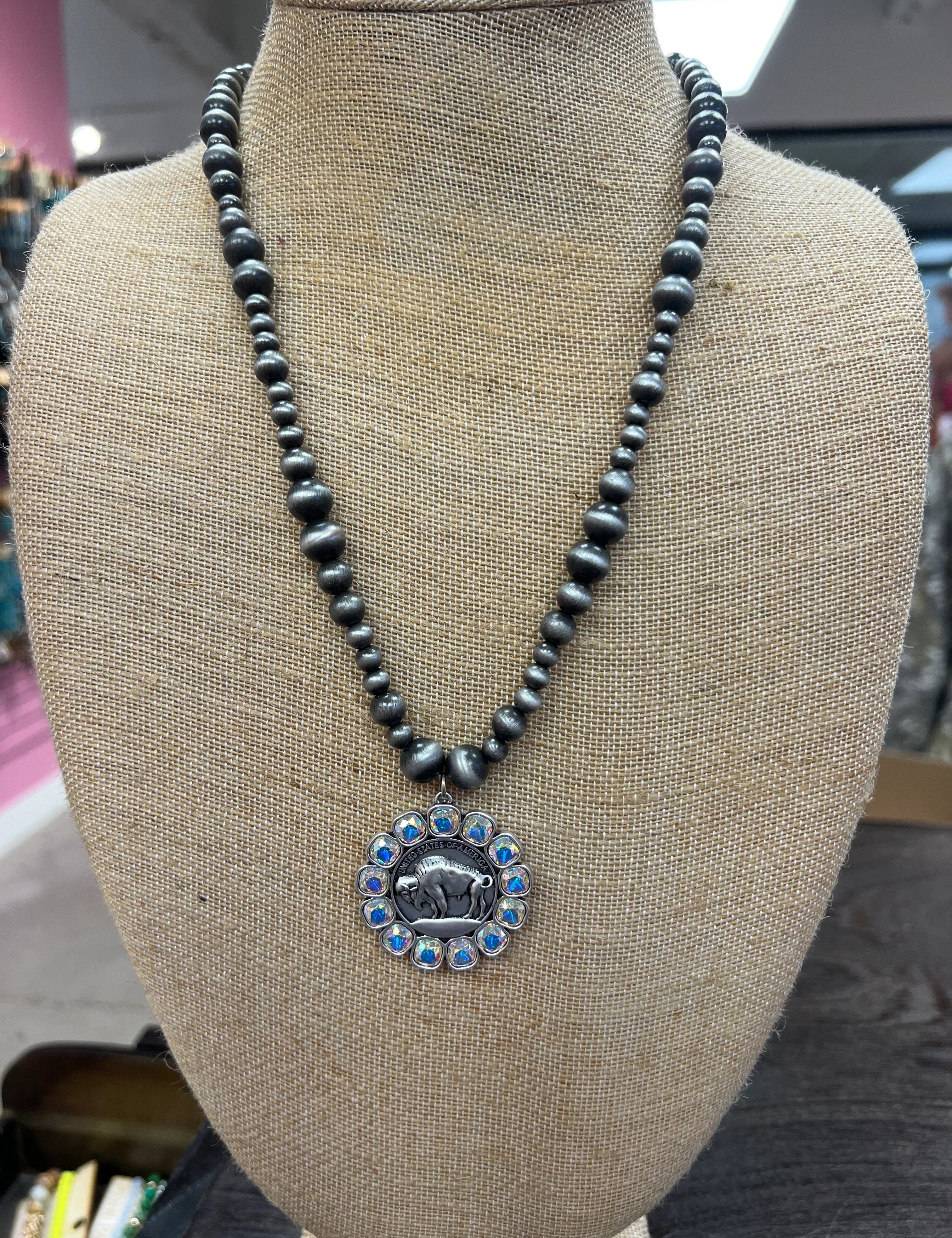 PINK PANACHE Navajo Pearl Bling Buffalo Necklace on Simply Obsessed