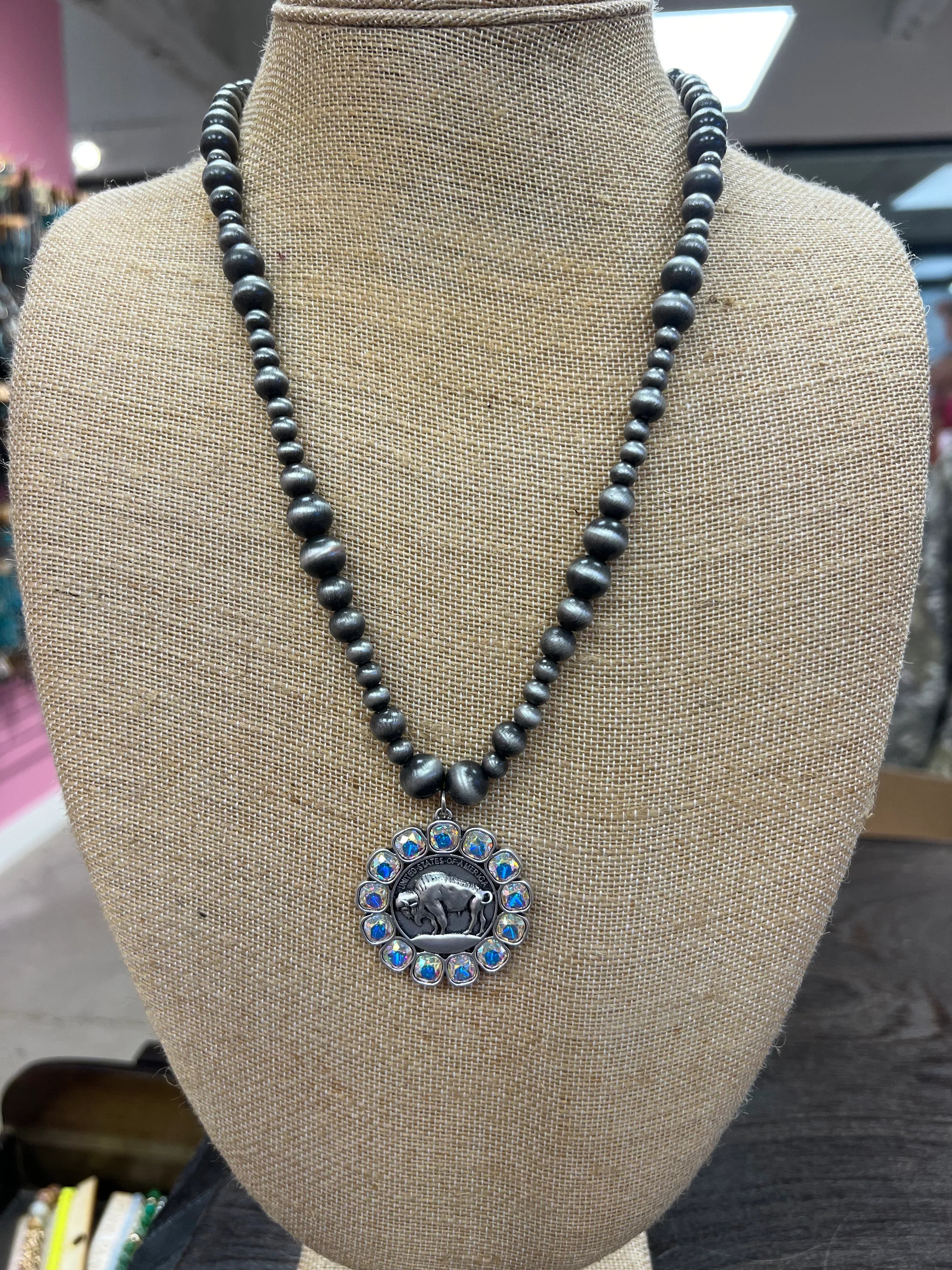 PINK PANACHE Navajo Pearl Bling Buffalo Necklace on Simply Obsessed