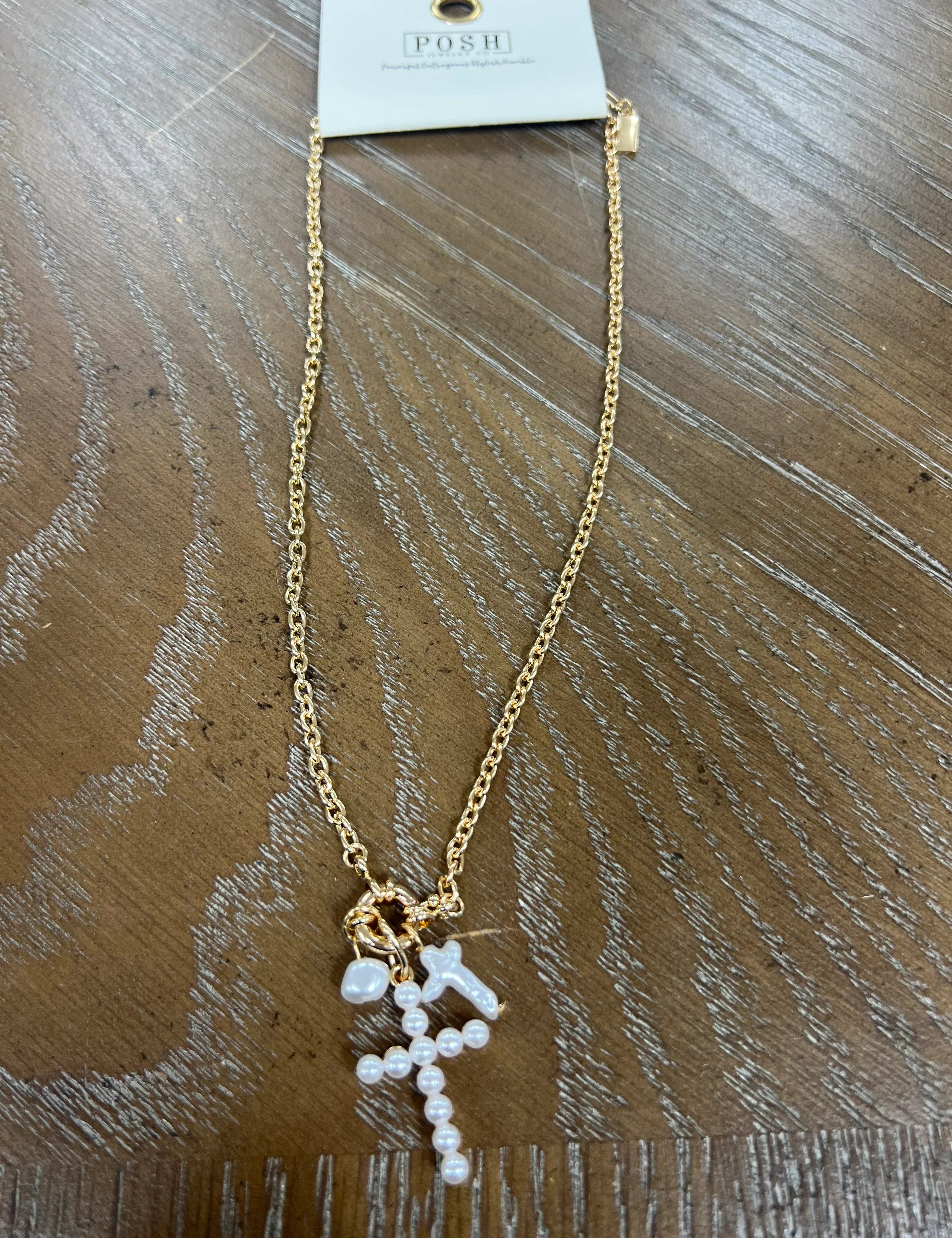 PINK PANACHE Pearl Cross Charm Necklace on Simply Obsessed