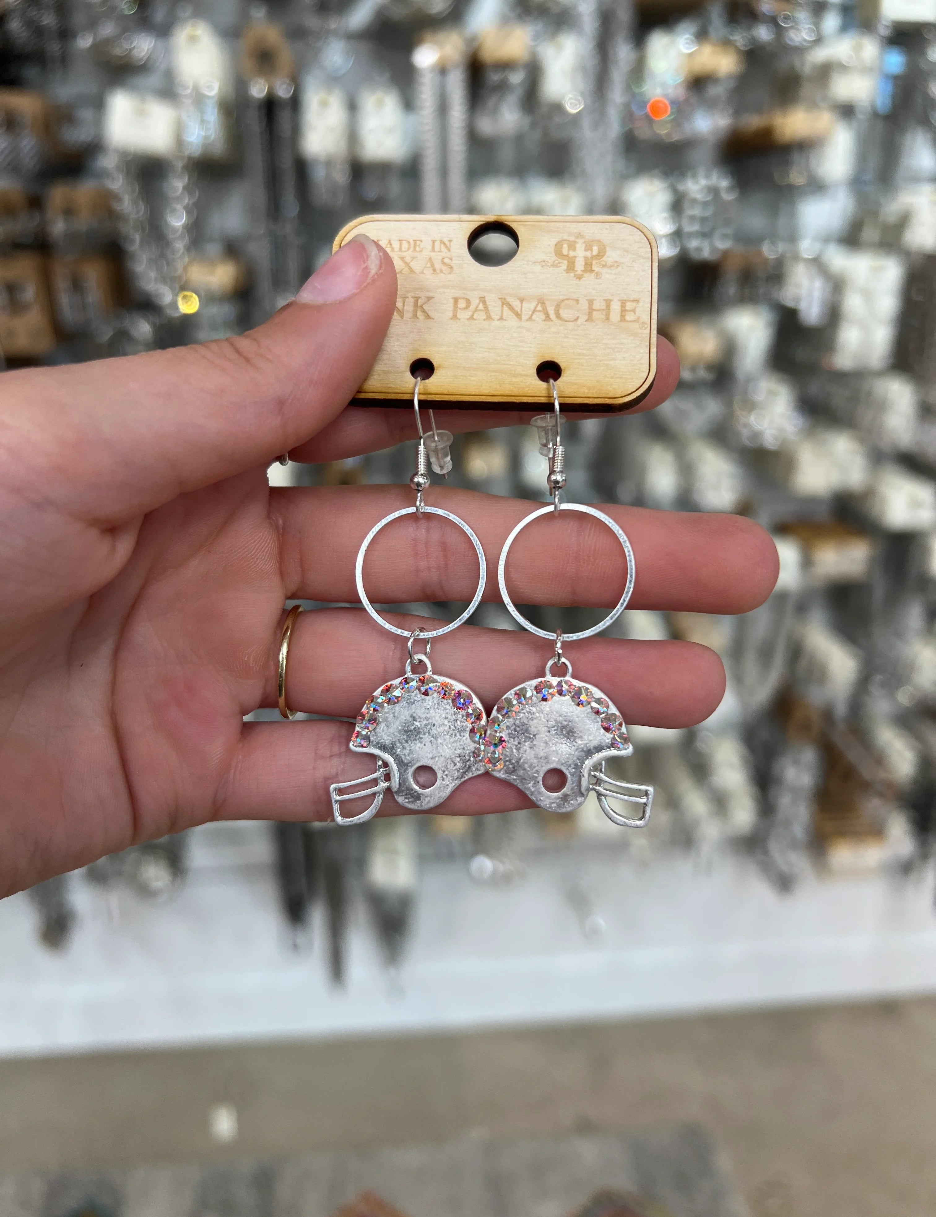 PINK PANACHE Silver Bling Football Earrings on Simply Obsessed