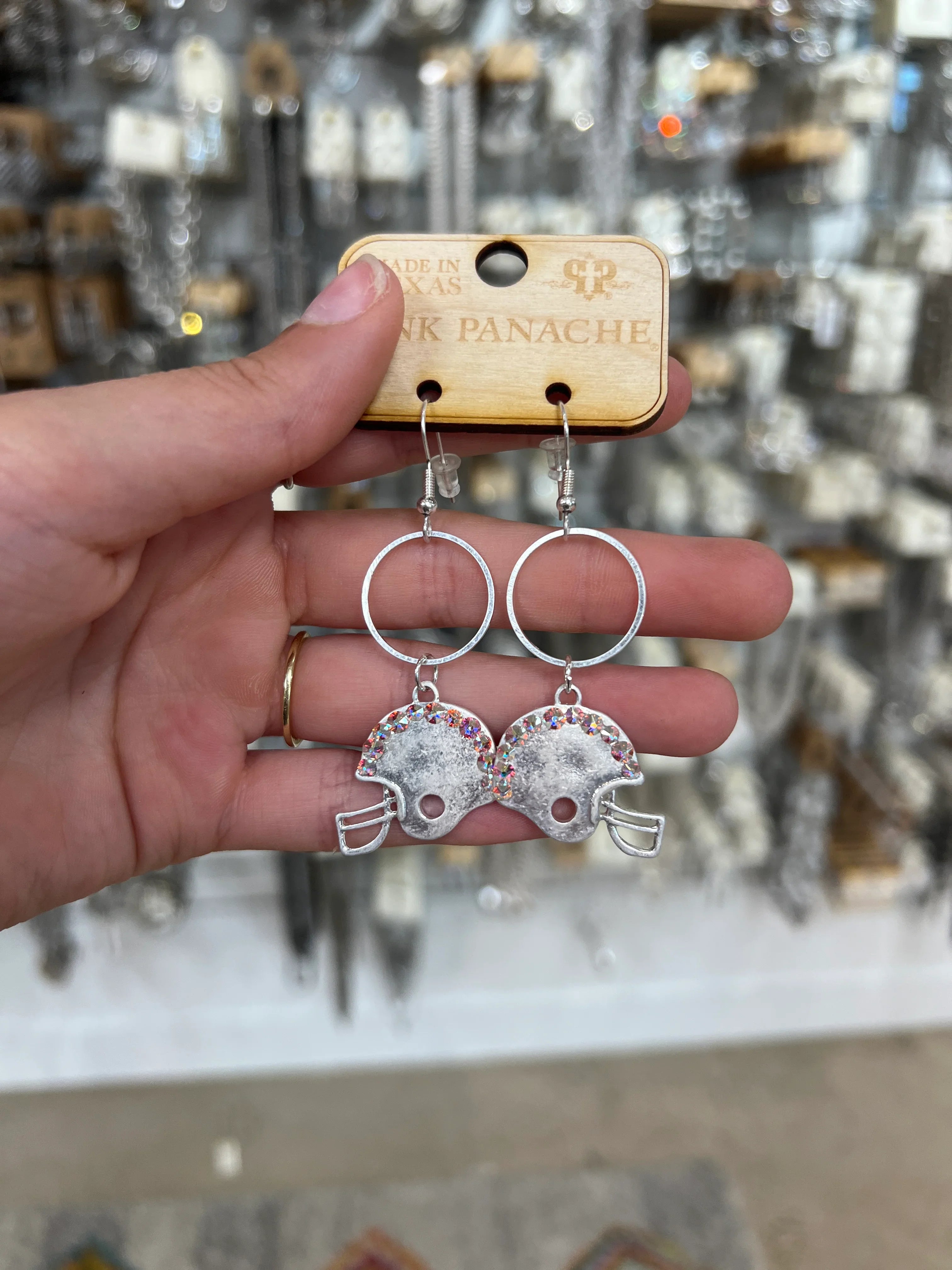 PINK PANACHE Silver Bling Football Earrings on Simply Obsessed