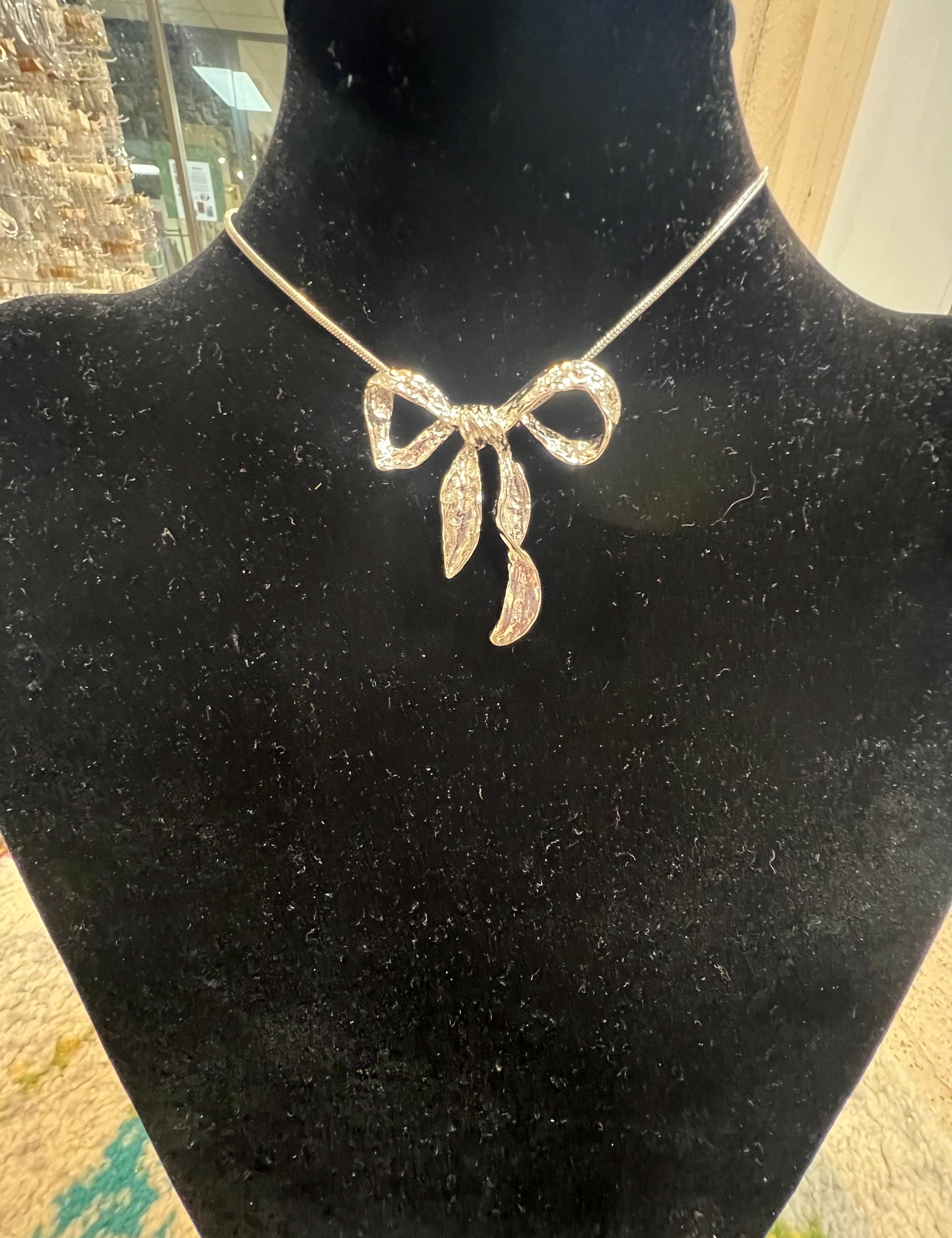 PINK PANACHE Silver Bow Necklace on Simply Obsessed