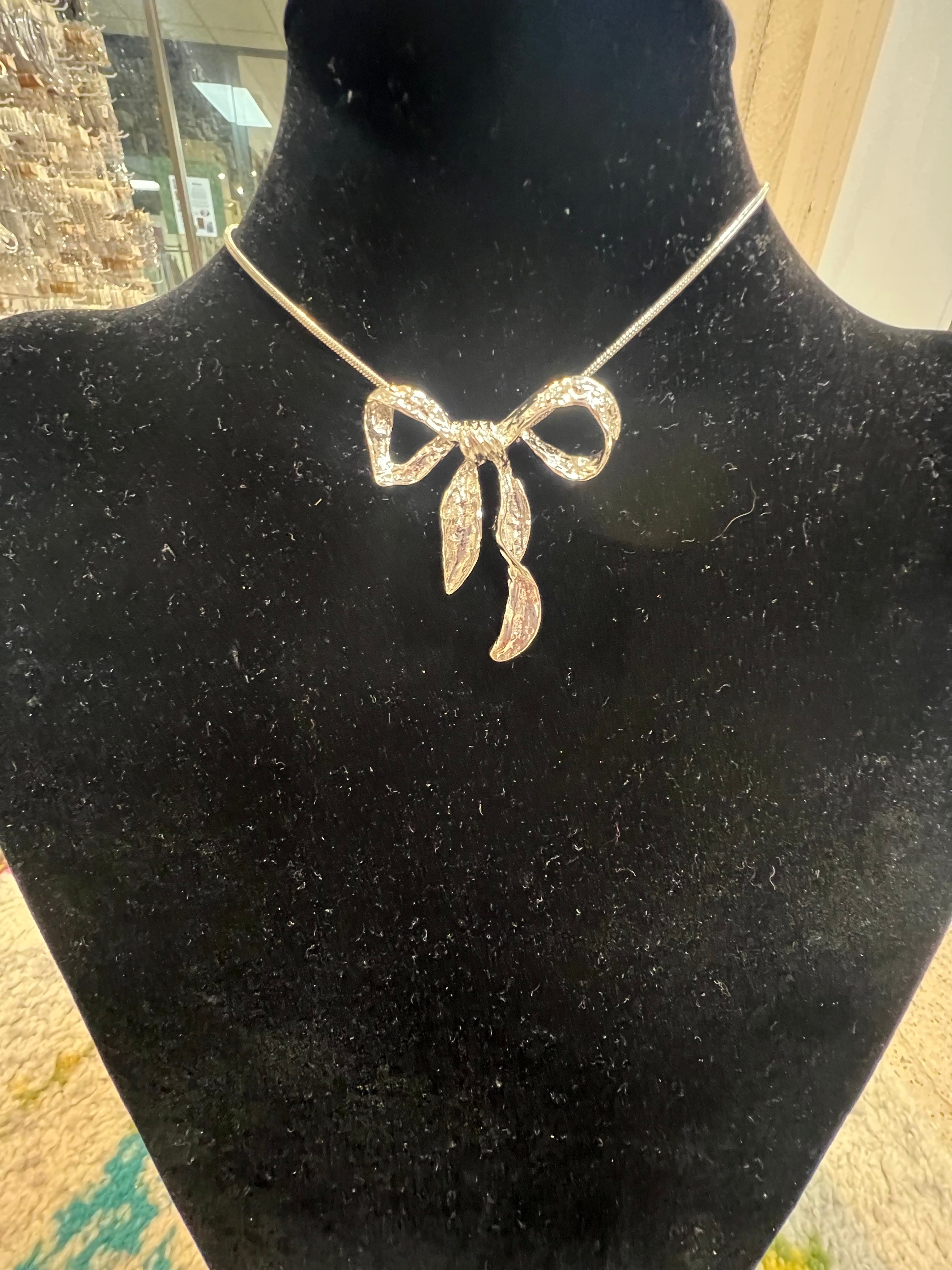 PINK PANACHE Silver Bow Necklace on Simply Obsessed