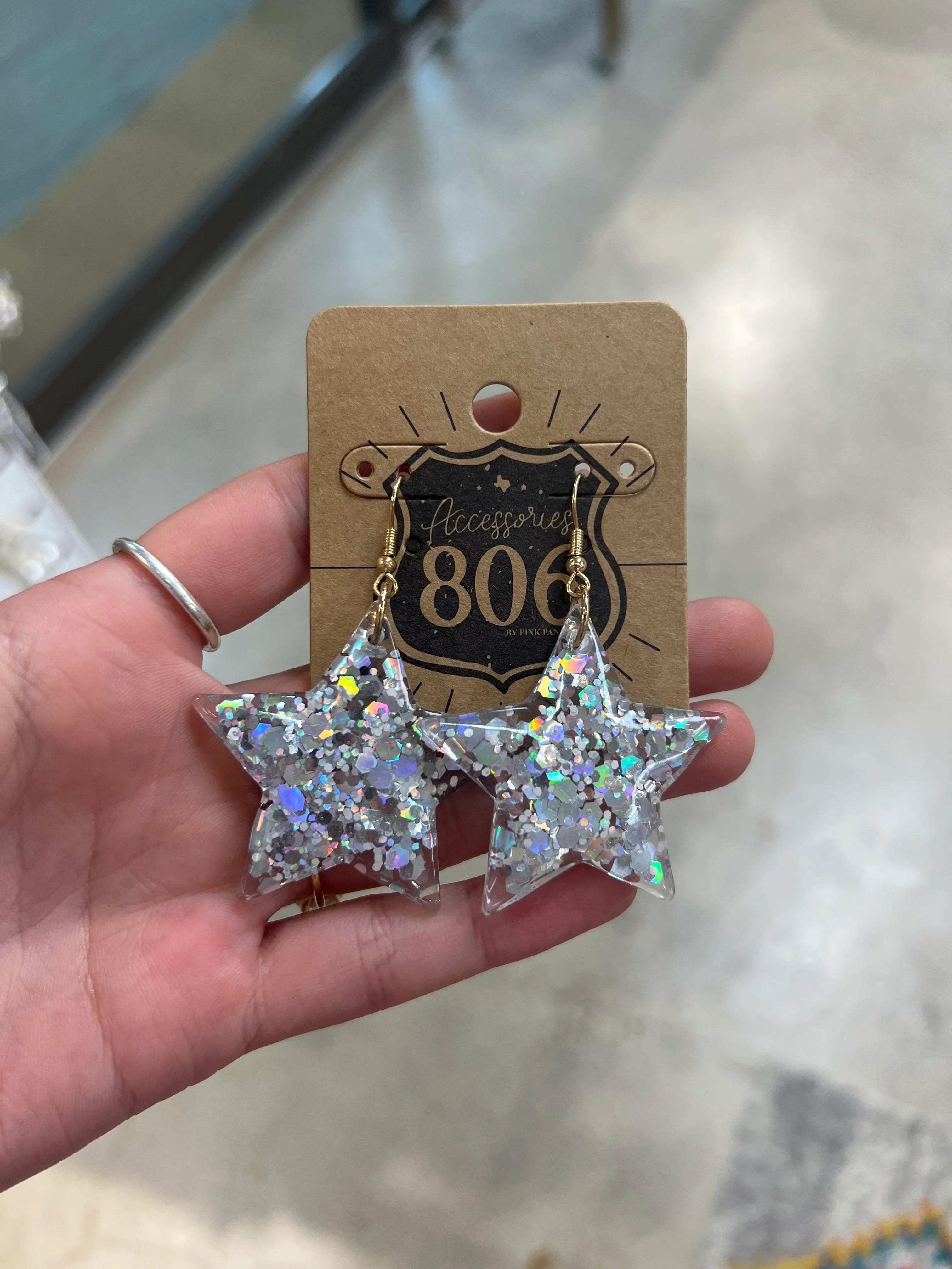 PINK PANACHE Silver Glitter Star Earrings on Simply Obsessed